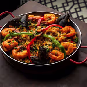 Soul Tapas And Bar signature dishes Seafood PaellaSpecial Bowl ChickenHouse Chicken Wings
